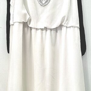 Elegant White Dress with Lace Detail